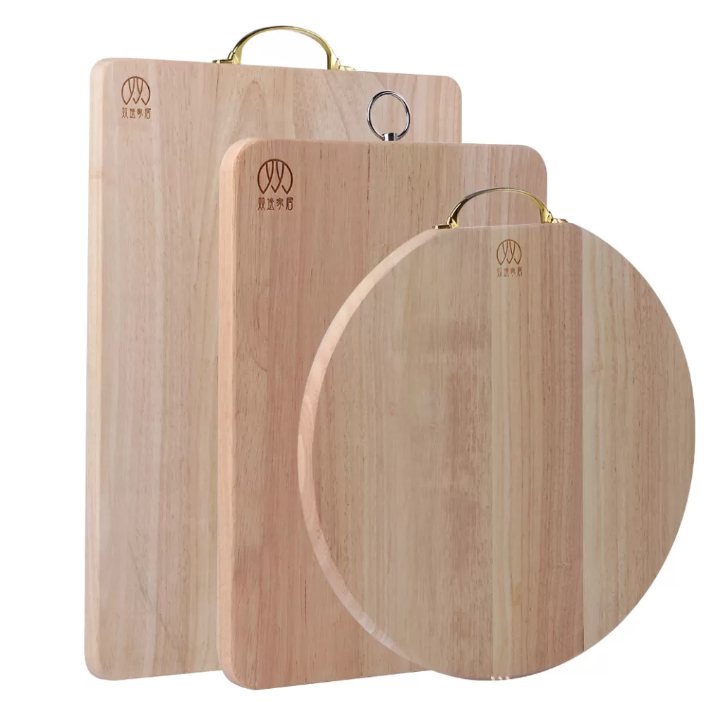 Set of three wooden cutting boards with metal handles.